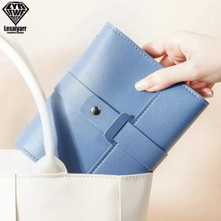 Jewelry storage bag in book shape for travel organization