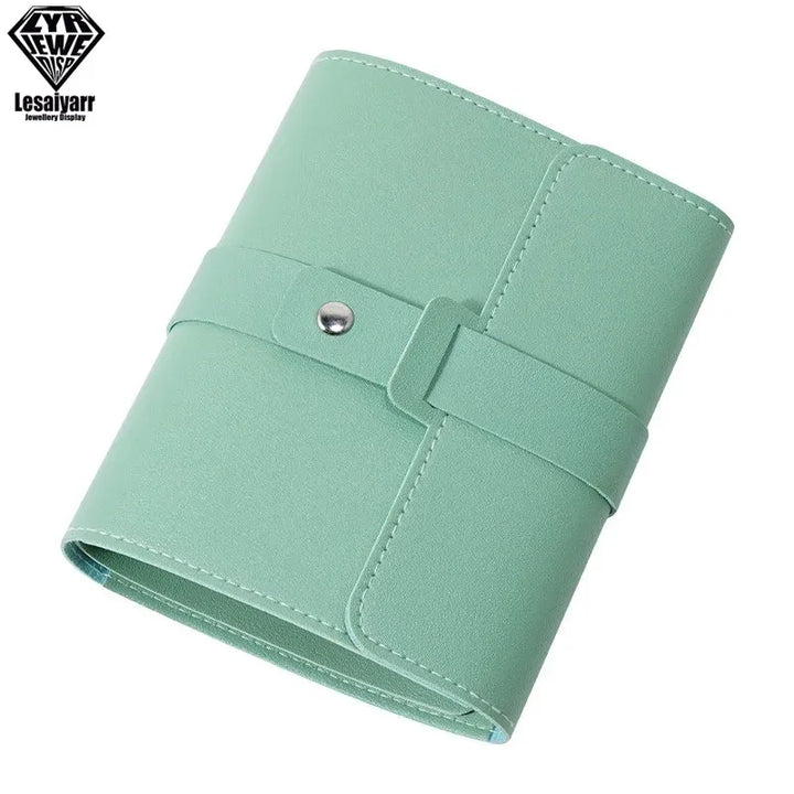 Jewelry storage bag in book shape for travel organization