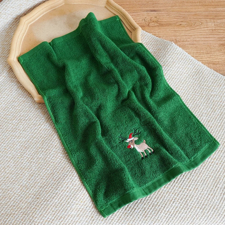 Christmas soft cotton towels in red, green, and white with holiday designs