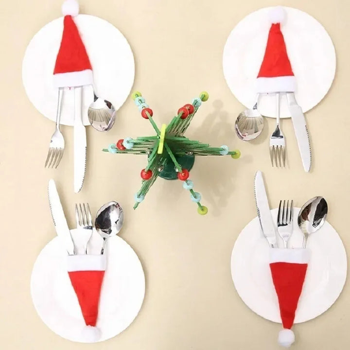 Lavender shop Santa Hat Cuterly Holders
Santa hat dining table decorations
Holiday cutlery holders for parties
Fun Santa hat utensil wraps